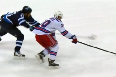 Kreider skates by Byfuglien and dekes Pavelec