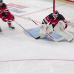 Tage Thompson scores a goal against the New Jersey Devils