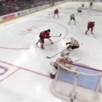 Paul Cotter scores a goal against the Boston Bruins