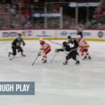 Mikael Backlund scores a goal against the New Jersey Devils