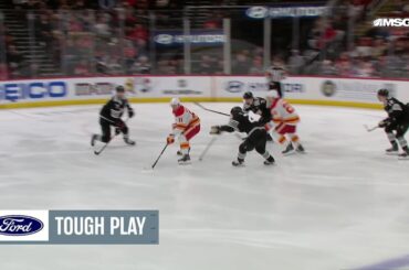 Mikael Backlund scores a goal against the New Jersey Devils