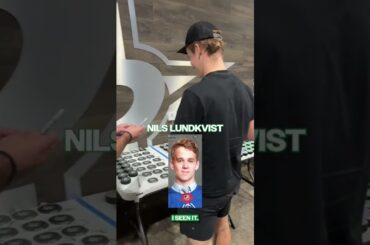 Asking Dallas Stars players to sign old photos of themselves