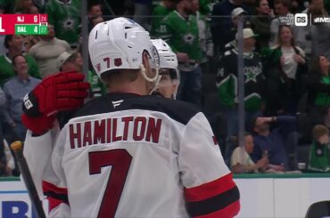 Dougie Hamilton scores a goal against the Dallas Stars