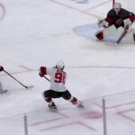 Timo Meier scores a goal against the Carolina Hurricanes