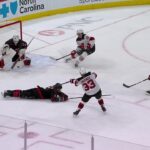 Evgenii Dadonov scores a goal against the Carolina Hurricanes