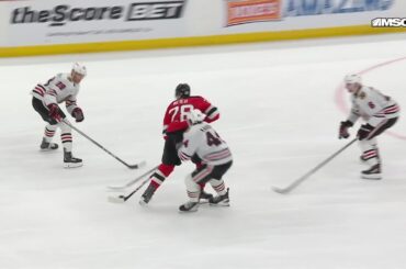Dougie Hamilton scores a goal against the Chicago Blackhawks