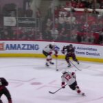 Jordan Staal scores a goal against the New Jersey Devils