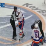 Sam Carrick goes down hard holding his arm after a center ice tilt with Anders Lee ❌