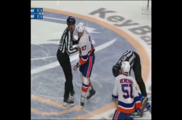 Sam Carrick goes down hard holding his arm after a center ice tilt with Anders Lee ❌