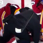 NHL Hockey - Panthers' A.J. Greer hits Flames' Connor Zary from behind, receives game misconduct