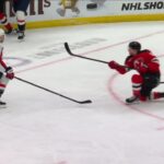 Dawson Mercer scores a goal against the Washington Capitals