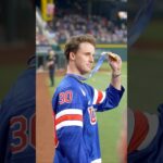 Jake Oettinger throws out the first pitch at the Texas Rangers’ home opener