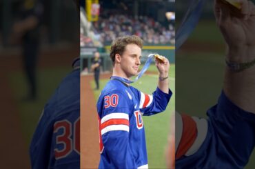 Jake Oettinger throws out the first pitch at the Texas Rangers’ home opener