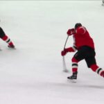 Dougie Hamilton scores a goal against the Washington Capitals