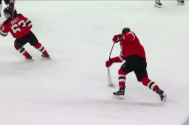 Dougie Hamilton scores a goal against the Washington Capitals