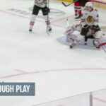 Simon Nemec scores a goal against the Chicago Blackhawks