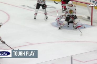 Simon Nemec scores a goal against the Chicago Blackhawks