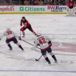 Jack Hughes scores a goal against the Washington Capitals