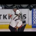 Carter pops back up after taking a hard punch by Kesler