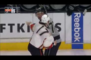 Carter pops back up after taking a hard punch by Kesler