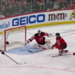 Tyson Foerster scores a goal against the New Jersey Devils