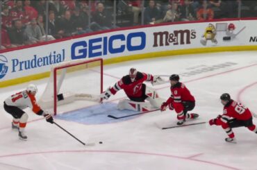 Tyson Foerster scores a goal against the New Jersey Devils