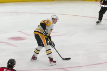 Bryan Rust scores a goal against the New Jersey Devils
