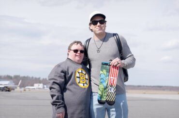 Charlie McAvoy designs socks with Dylan Larkin for World Down Syndrome Day
