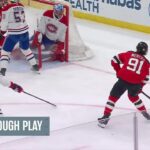 Dawson Mercer scores a goal against the Montréal Canadiens