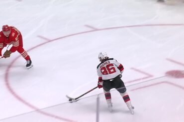 Jack Hughes scores a goal against the Detroit Red Wings
