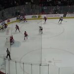 Laval Rocket's Filip Mešár runs over the referee in game vs. Utica Comets 3/25/26