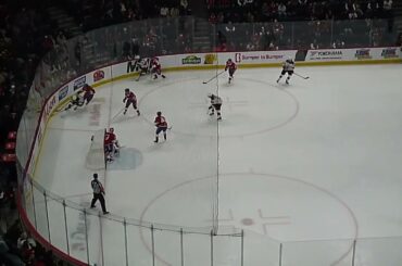 Laval Rocket's Filip Mešár runs over the referee in game vs. Utica Comets 3/25/26
