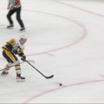 Yegor Chinakhov scores a goal against the New Jersey Devils