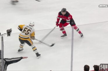 Thomas Novak scores a goal against the New Jersey Devils