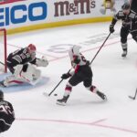 Fabian Zetterlund scores a goal against the New Jersey Devils