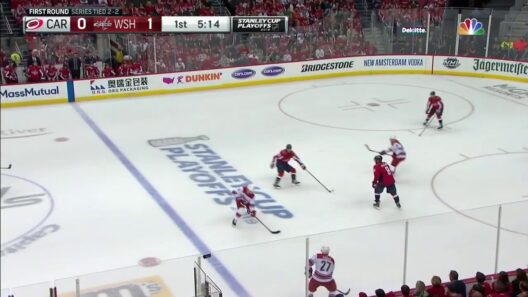 Tom Wilson elbows Greg McKegg, sending him to the locker room